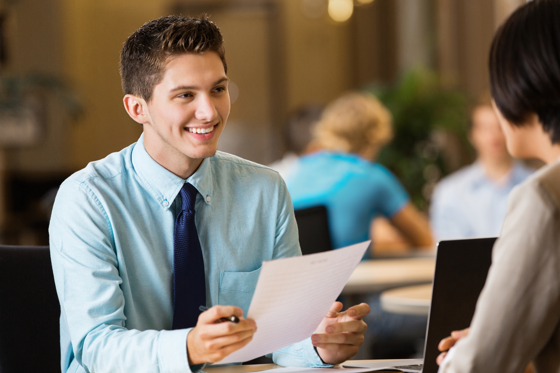 Smiling student in a professional interview setting